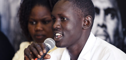 A man addresses the audience at the Rights at the Round Table Event