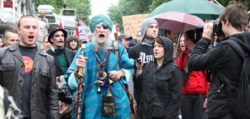 A brightly dressed man joins the Occupy Melbourne protest