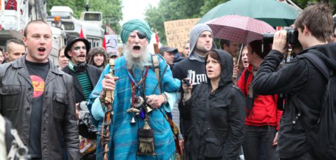 A brightly dressed man joins the Occupy Melbourne protest