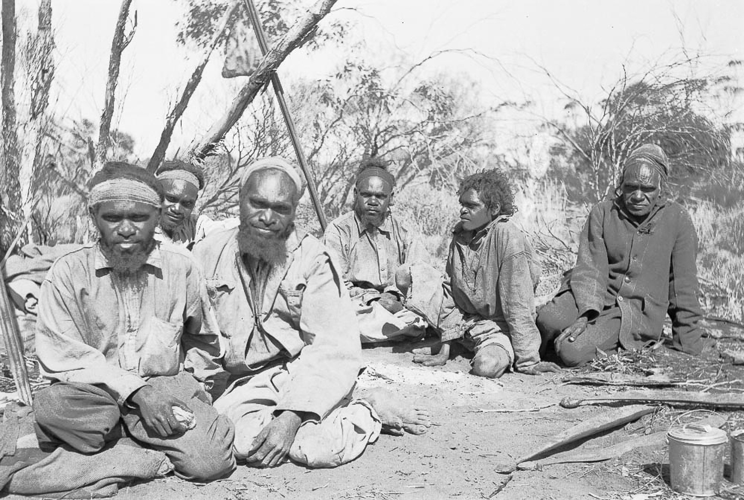 Jack Jamieson, Albert Jamieson, Frank Hogan, Arthur Jamieson and Bill Jamieson with tracker Jimmy Maadi (right) at the ration station, wearing their first set of clothes. Anangu were given western names by the missionaries, as their Indigenous names were deemed too difficult to pronounce. Families were also split up due to a lack of understanding about complex kinship relationships held by Anangu.