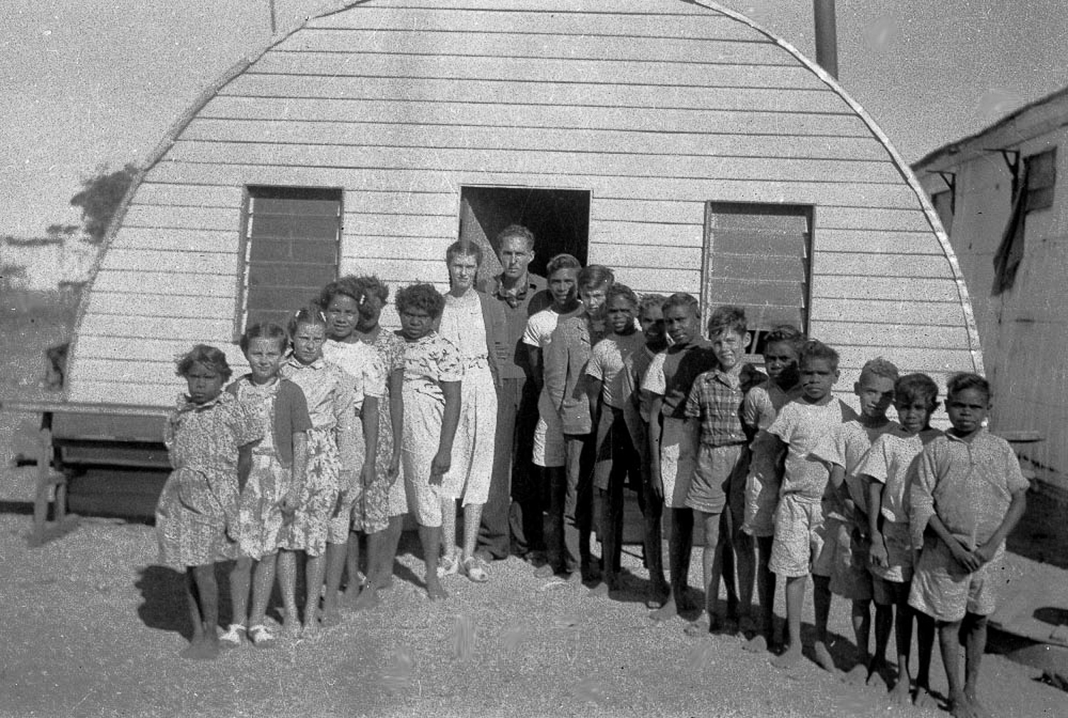 Part of the assimilation policy meant taking Anangu children from their parents to send them to school. Students would be taught in English and learn a western curriculum.
