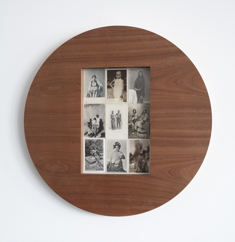 Photographs of indigenous women within circular wooden frame