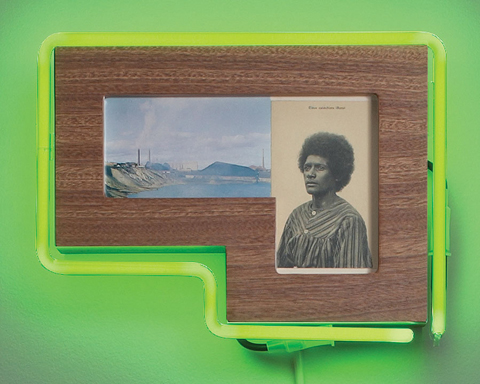 Photograph of indigenous woman and mining dam within green neon light