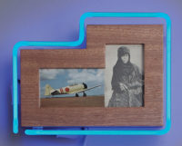 Photograph of woman in traditional dress and japanese war plane within blue neon light