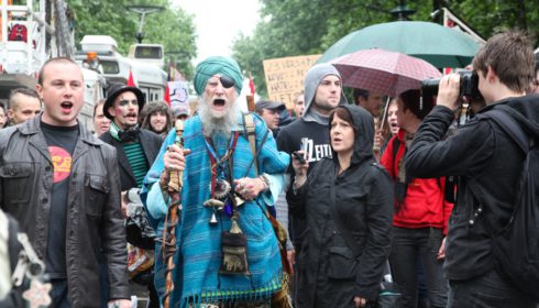 A brightly dressed man joins the Occupy Melbourne protest