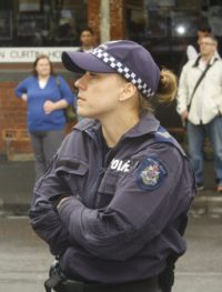 A police officer without her badge