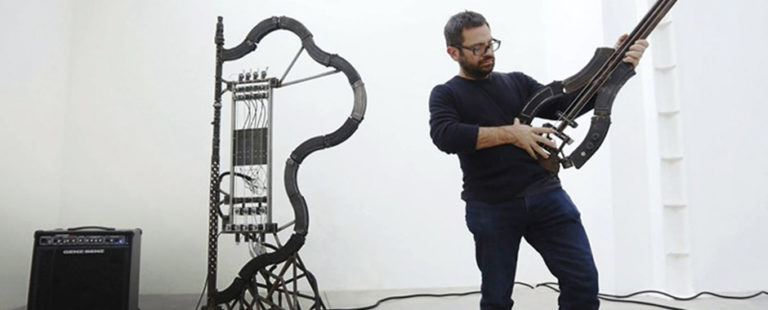 Pedro Reyes playing his instruments, made from gun parts