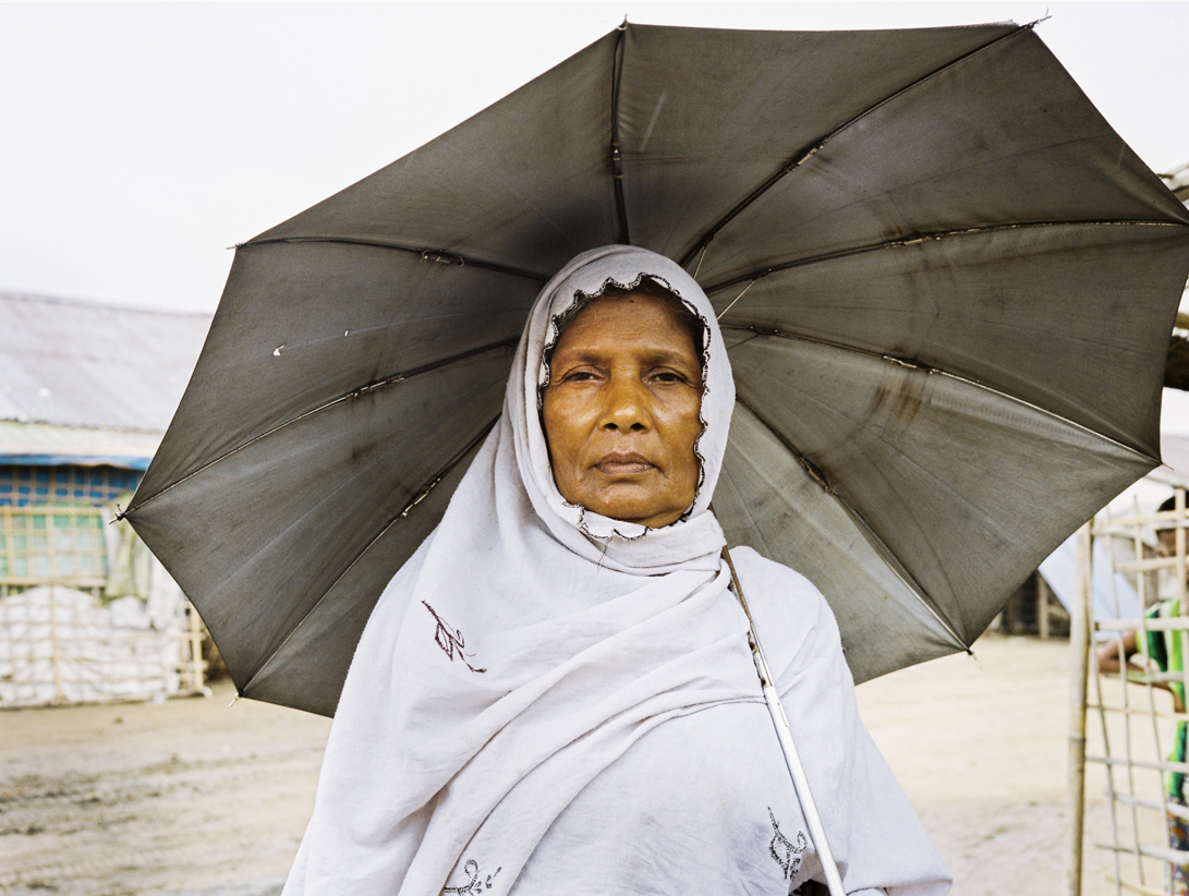 'Rohingya woman in IDP camp outside of Sittwe' - While previously holding the same rights as other Burmese people, Rohingya were excluded from citizenship under a controversial law in 1982. This means that, as non- citizens of Myanmar (or any other country), Rohingya cannot vote or hold office.