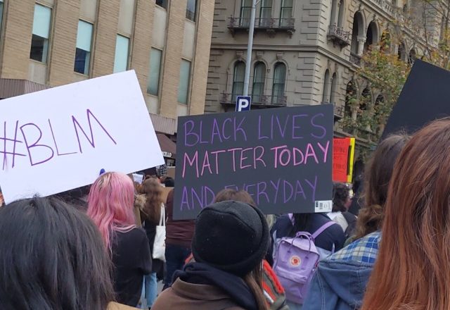 blm signs at melbourne protest june 2020