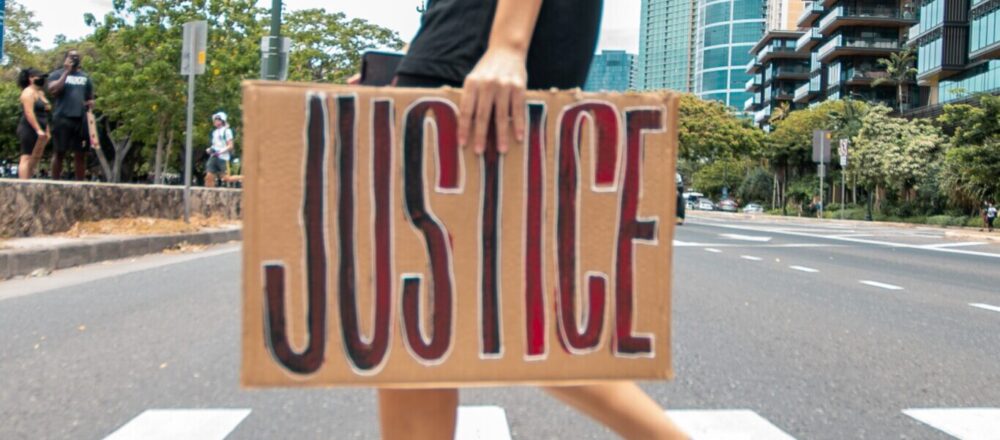 Protest placard reads justice