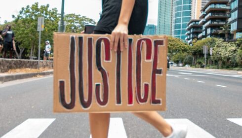 Protest placard reads justice